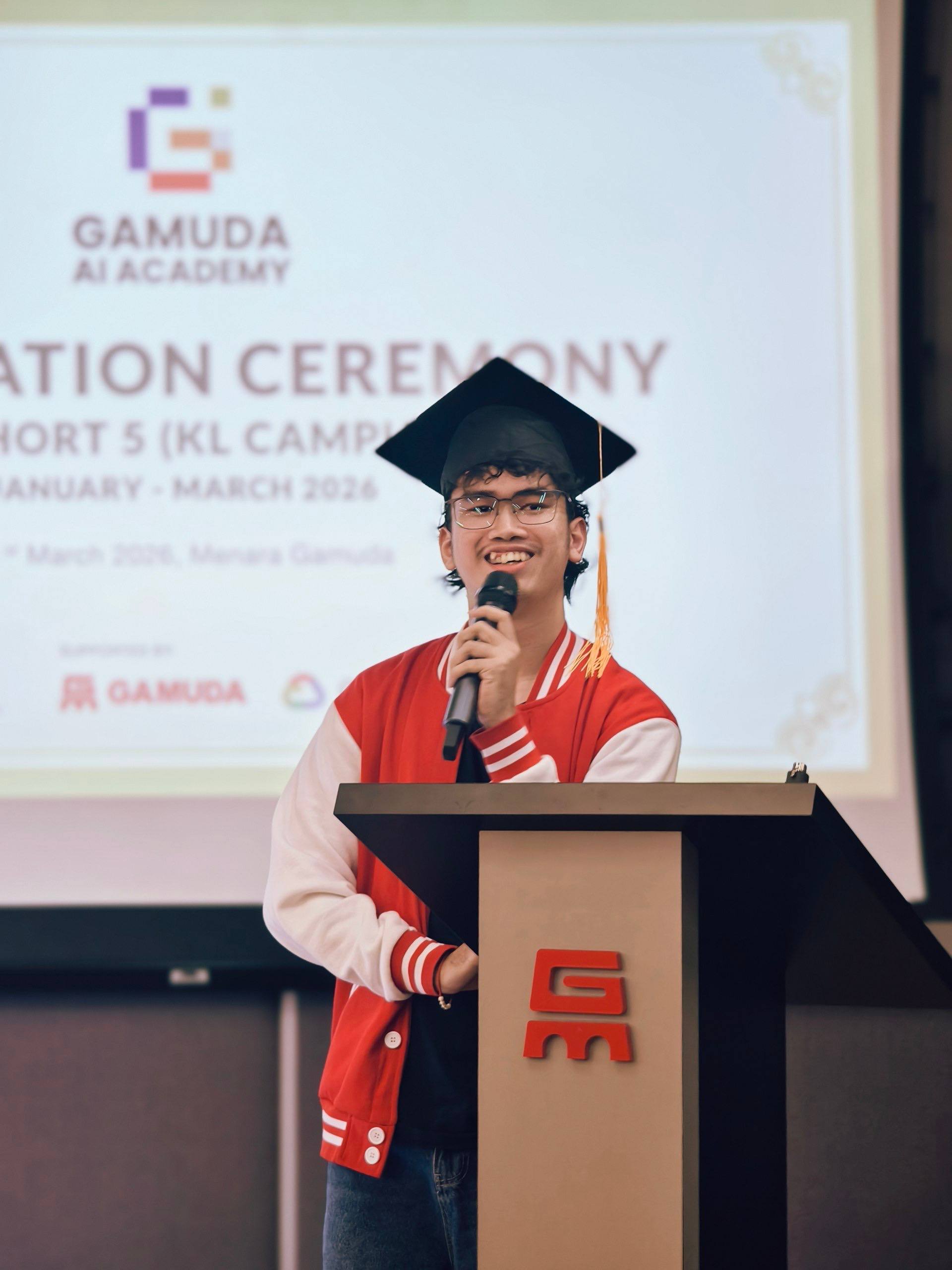 Varakorn giving the graduation speech at Gamuda AI Academy, KL Campus, March 2026
